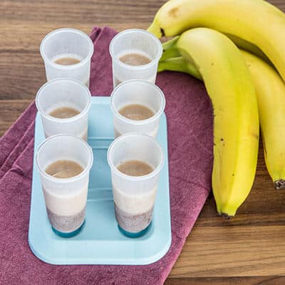 Pop cups and a bunch of bananas