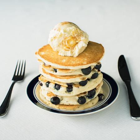 a scoop on top pancakes