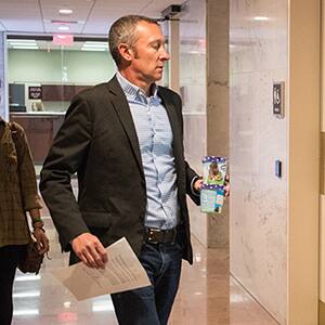 Ben & Jerry's Social Mission Manager Chris Miller delivers pints of ice cream to legislators in Washington, DC, 2016